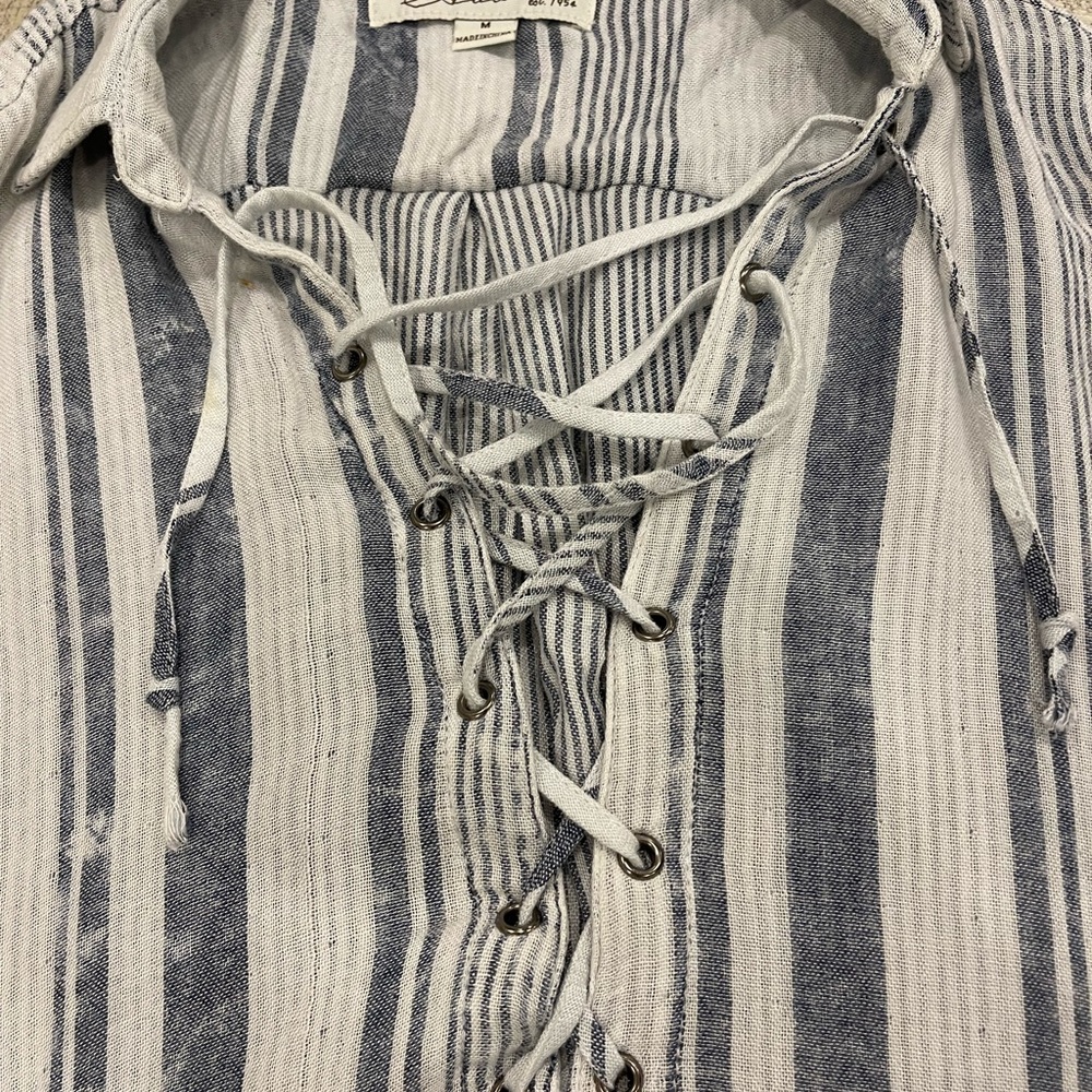Blue and white striped top by vintage Havana. Size medium.
